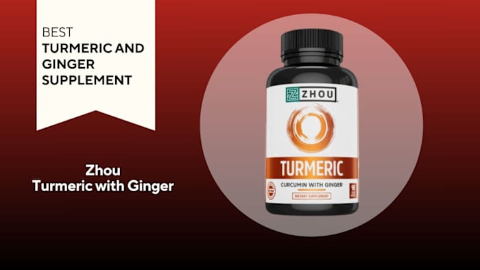 Black pill bottle with a white label that reads "TURMERIC" against a red background